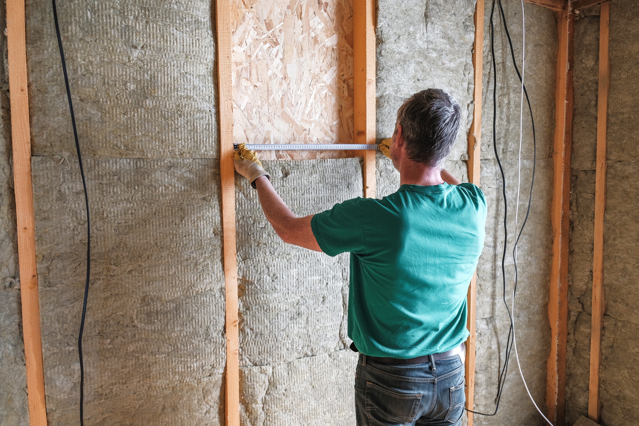 A contractor installing the insulation